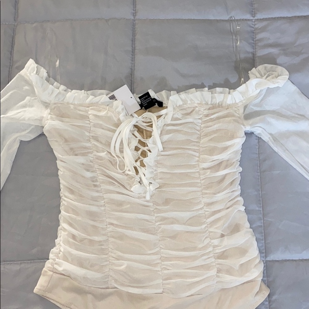 Ruffled lace long sleeve bodysuit